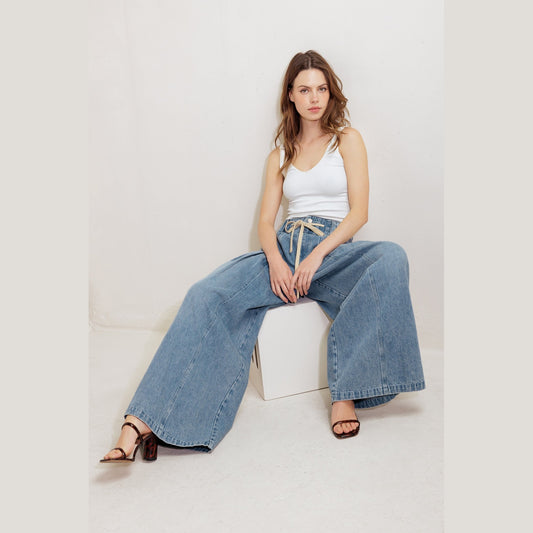 CONTRASTING TIE BLUE DENIM PANTS. Website exclusive · Ships direct!