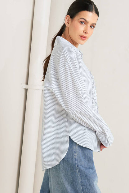 DAYLIGHT EDGE WOVEN RUFFLE DETAIL LONG SLEEVE TOP. Website exclusive · Ships direct!