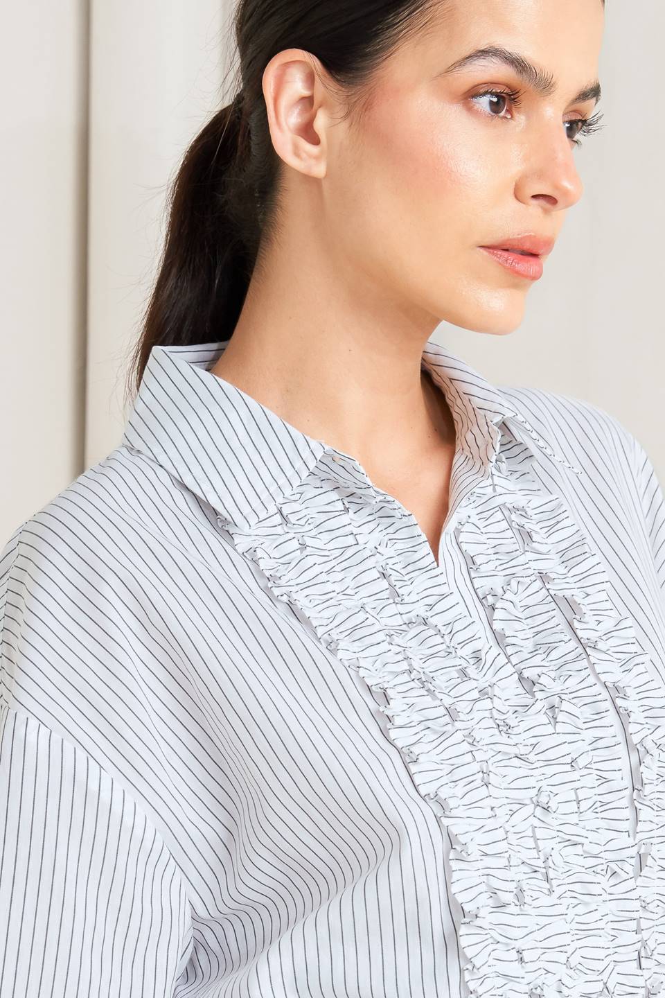 DAYLIGHT EDGE WOVEN RUFFLE DETAIL LONG SLEEVE TOP. Website exclusive · Ships direct!