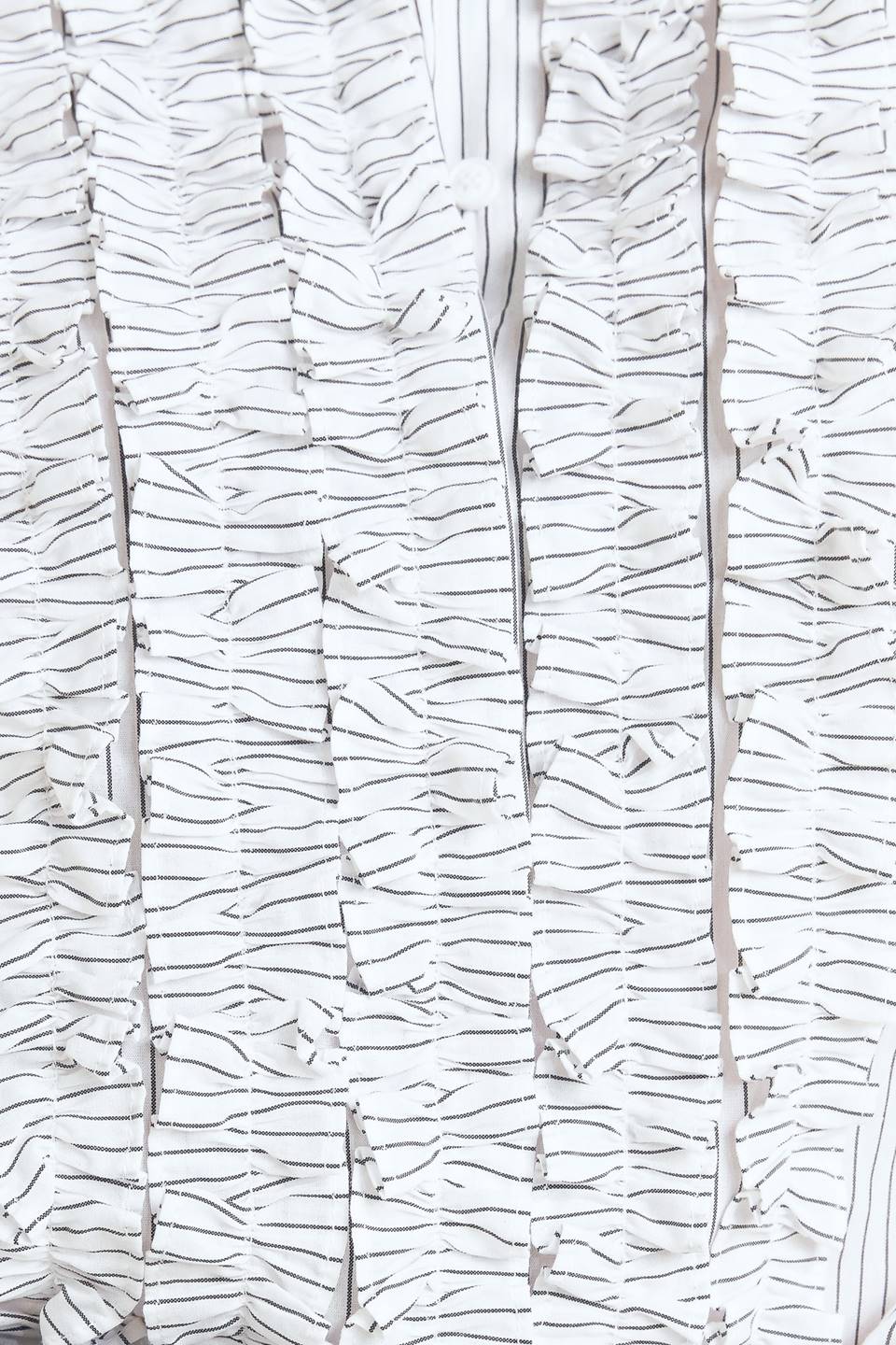 DAYLIGHT EDGE WOVEN RUFFLE DETAIL LONG SLEEVE TOP. Website exclusive · Ships direct!