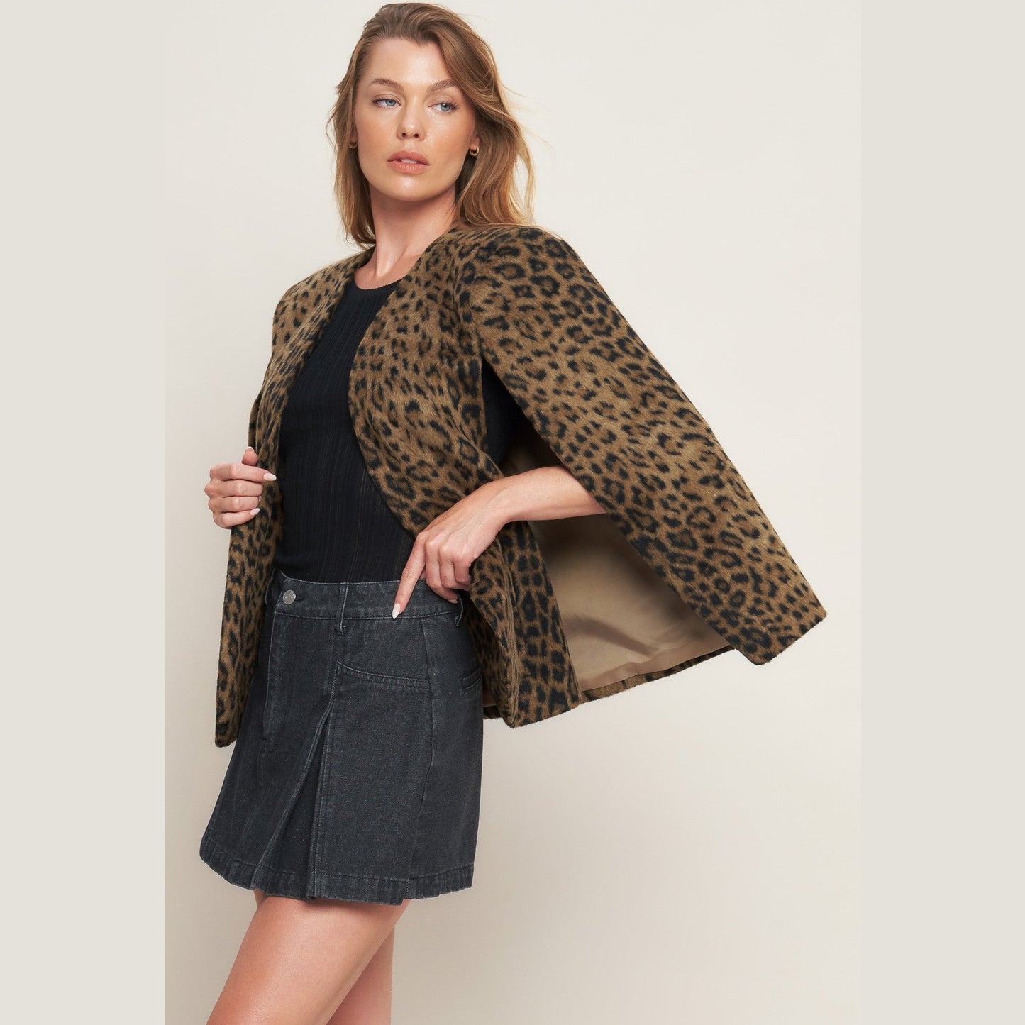 LEOPARD SAVAGE SOPHISTIQUE WOVEN CAPE. Website exclusive · Ships direct!