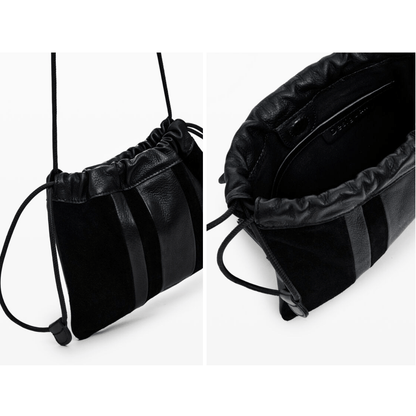 Bolso bandolera de piel con soporte para teléfono de Desigual en color negro